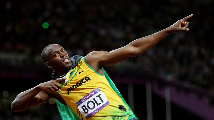Usain Bolt of Jamaica celebrates winning gold
