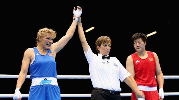 Nadezda Torlopova of Russia celebrates her victory against Jinzi Li of China