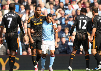 Carlos Tevez and Didier Drogba show their mutual respect