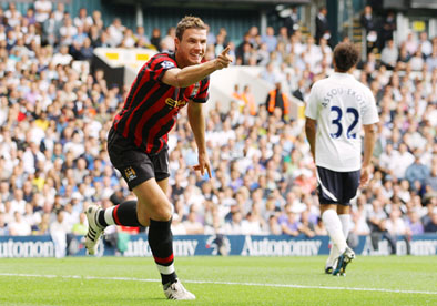 Edin Dzeko celebrates scoring first goal