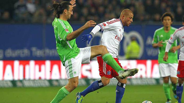 Sotirios_Kyrgiakos_left_Gokhan_Tore