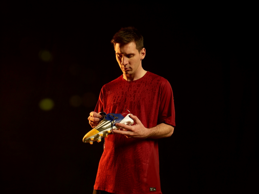 Leo holding UCL boot