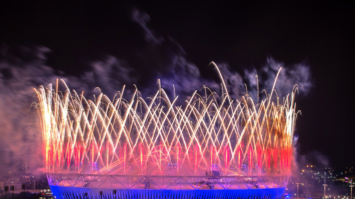 Fireworks are set off over the Olympic Stadium