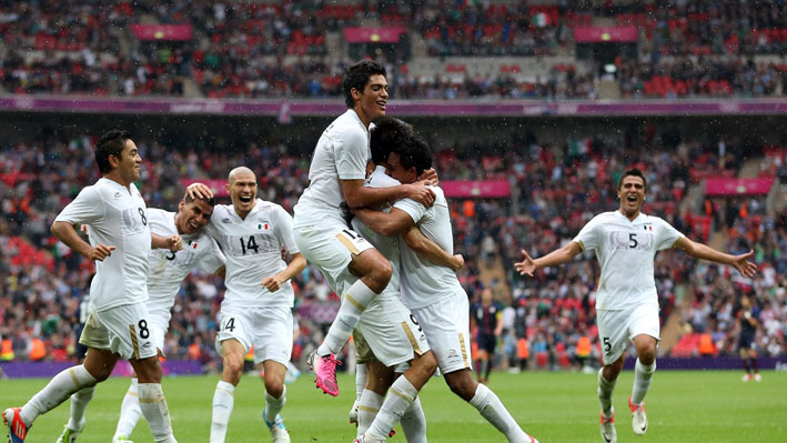 Javier Cortes of Mexico celebrates with team mates