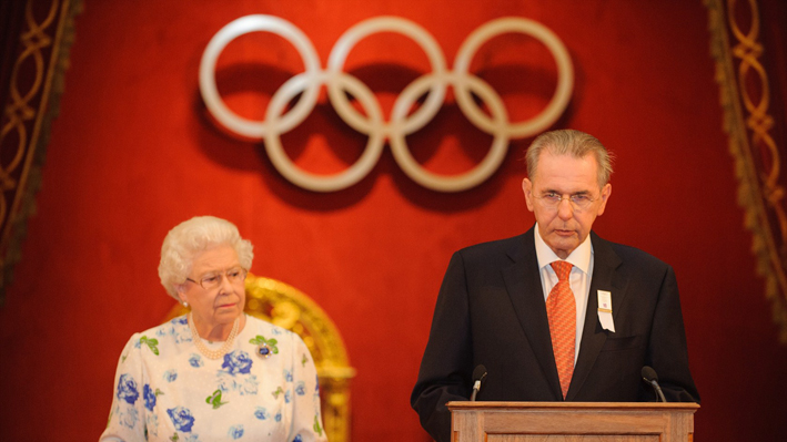 Queen Elizabeth II and IOC President Jacques Rogge attend IOC reception