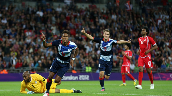 Scott Sinclair of Great Britain celebrates scoring a goal