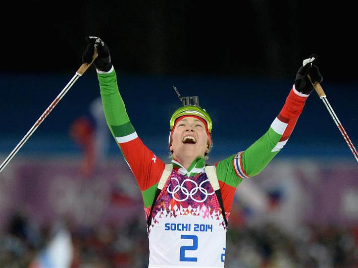 Darya Domracheva of Belarus celebrates