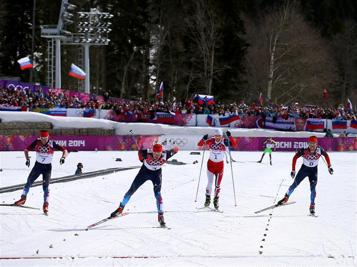 Silver medalist Maxim Vylegzhanin of Russia gold medalist Alexander Legkov of Russia and bronze medalist Ilia Chernousov of Russia
