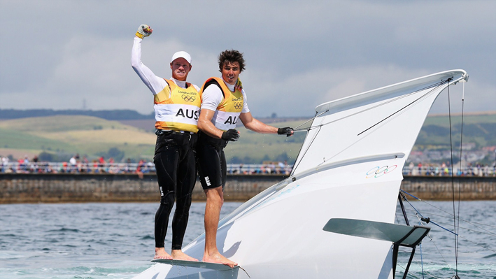 Australia celebrates winning gold in the Men's 49er Sailing