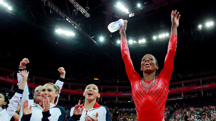 USA women celebrate Artistic Gymnastics team win