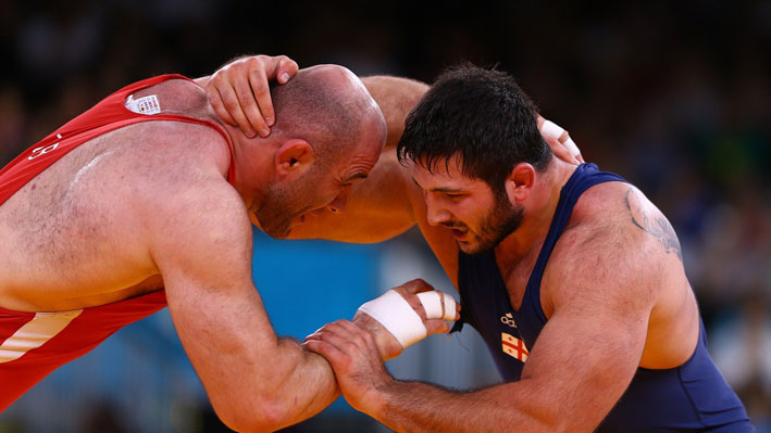 Artur Taymazov of Uzbekistan and Davit Modzmanashvili of Georgia