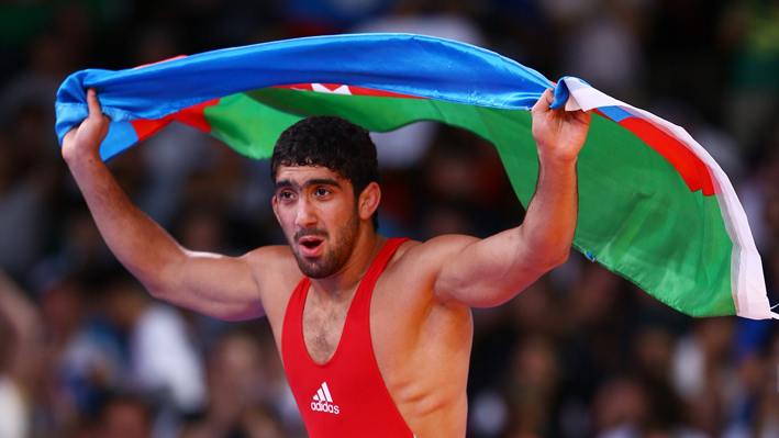 Toghrul Asgarov of Azerbaijan celebrates gold